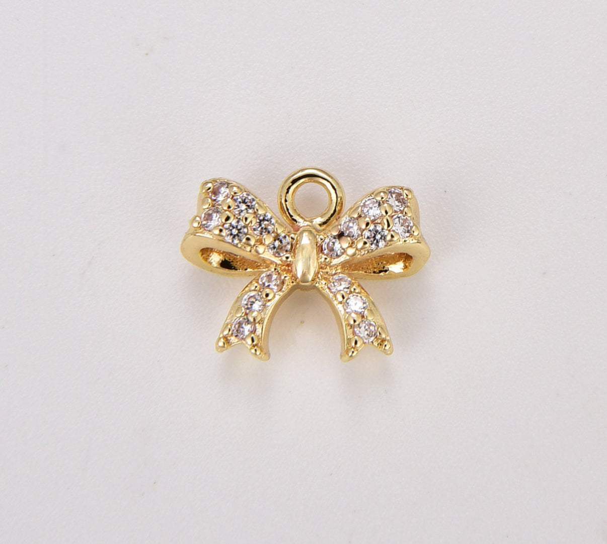 DIJE LAZO CON CIRCONES