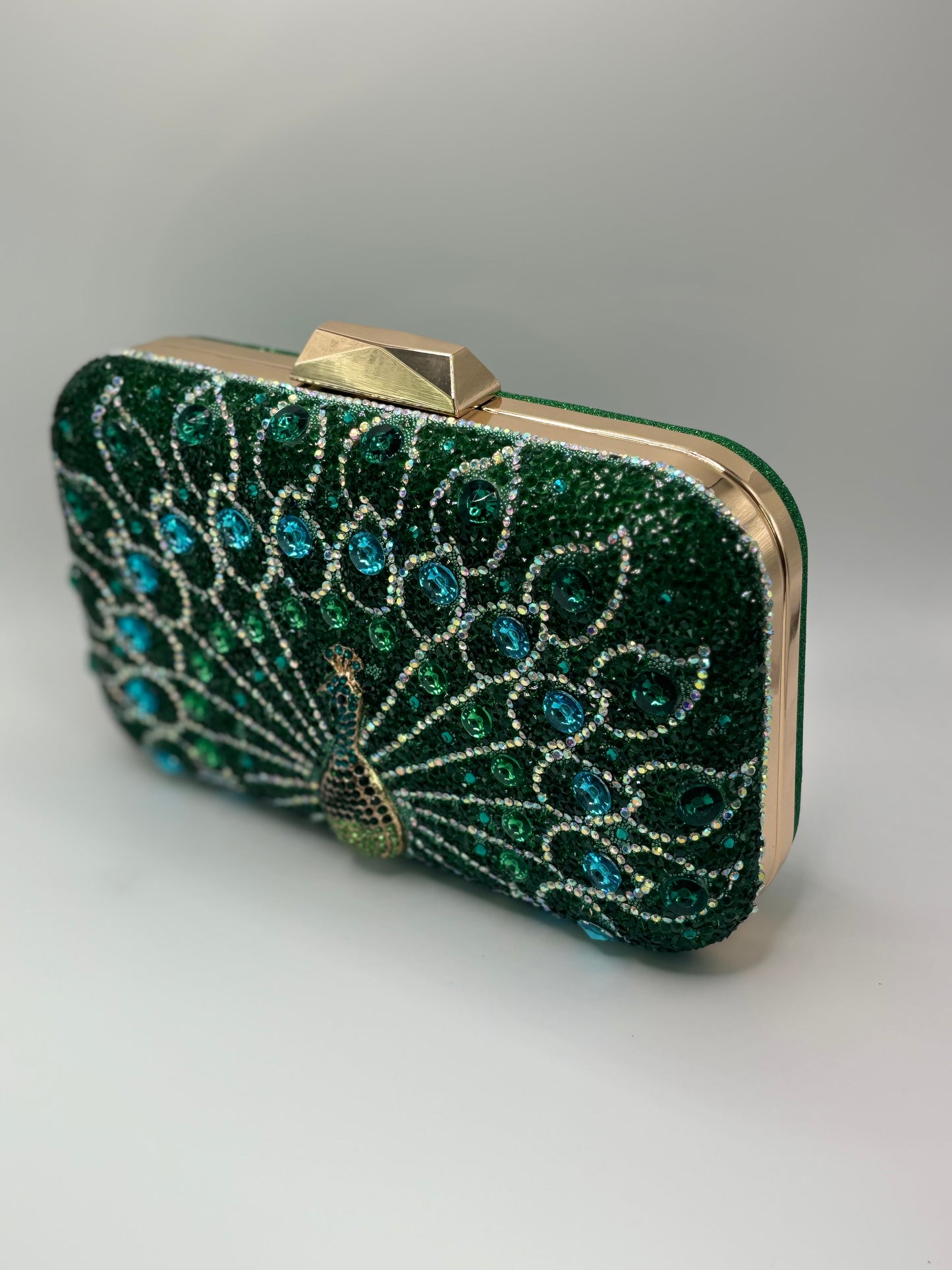 Clutch Pavo Real