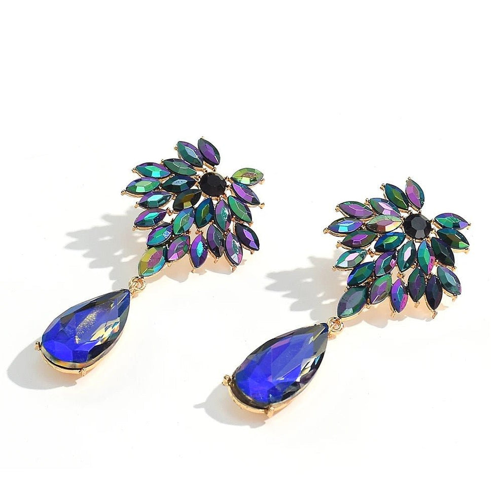 Aretes azules con tonos tornasol