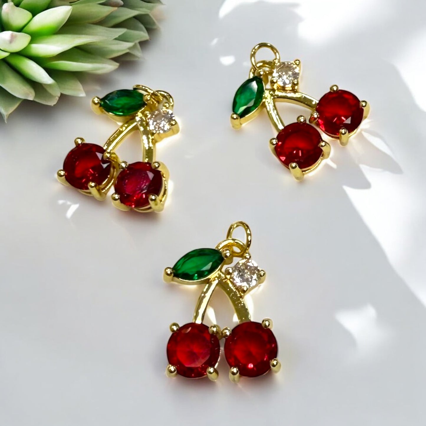 DIJE CEREZA CRISTAL CON CIRCON ARRIBA