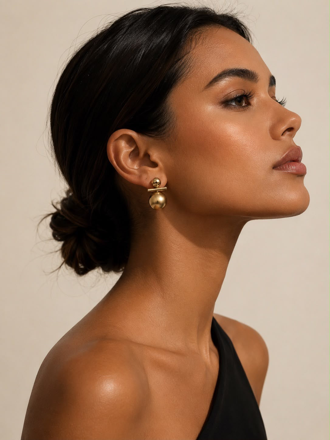 Aretes doble esfera acero y rodio baño de oro