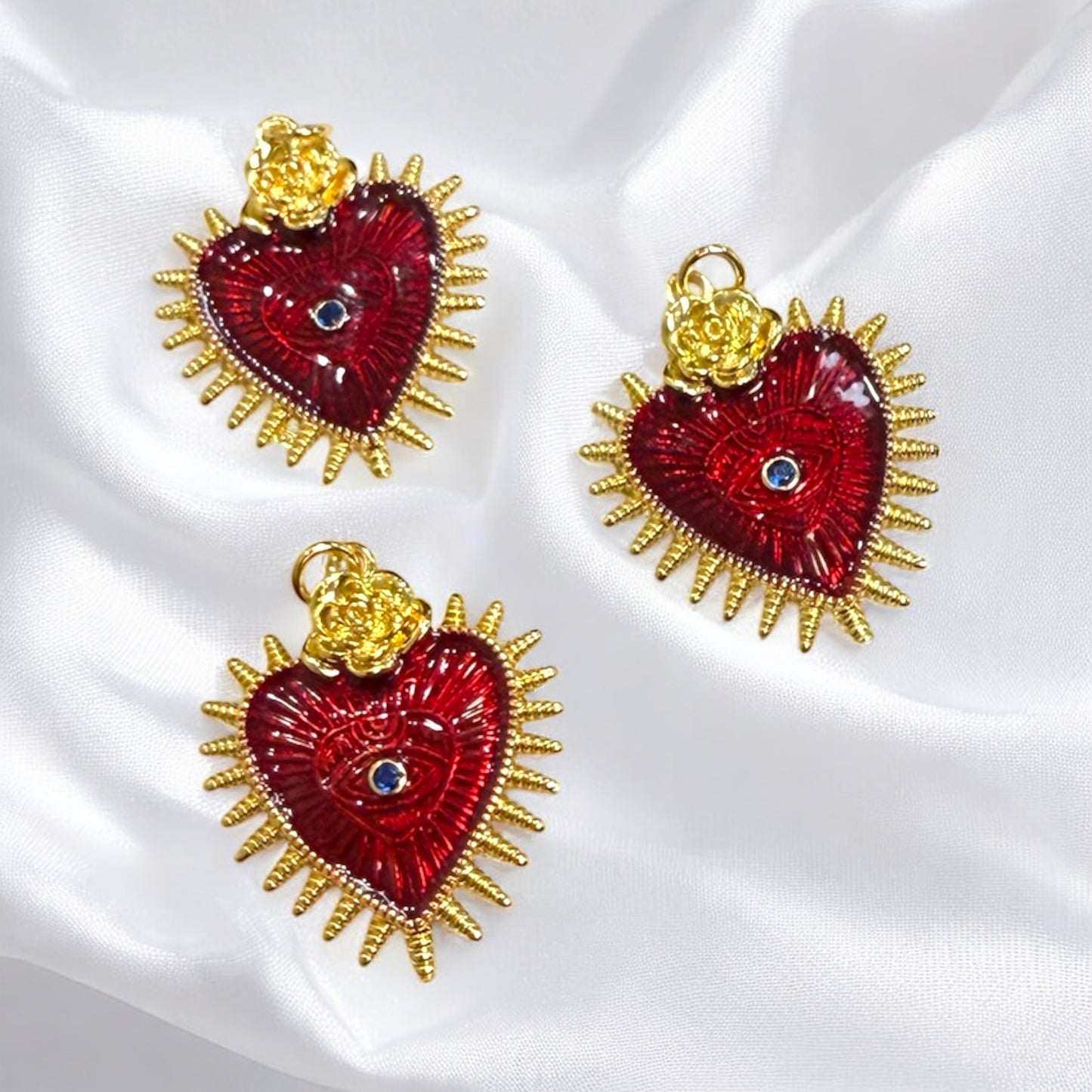 DIJE CORAZON FLOR CON OJO