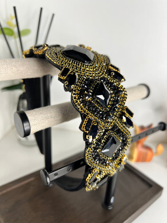 Diadema ancha de zirconia cúbica negra con dorado 03811