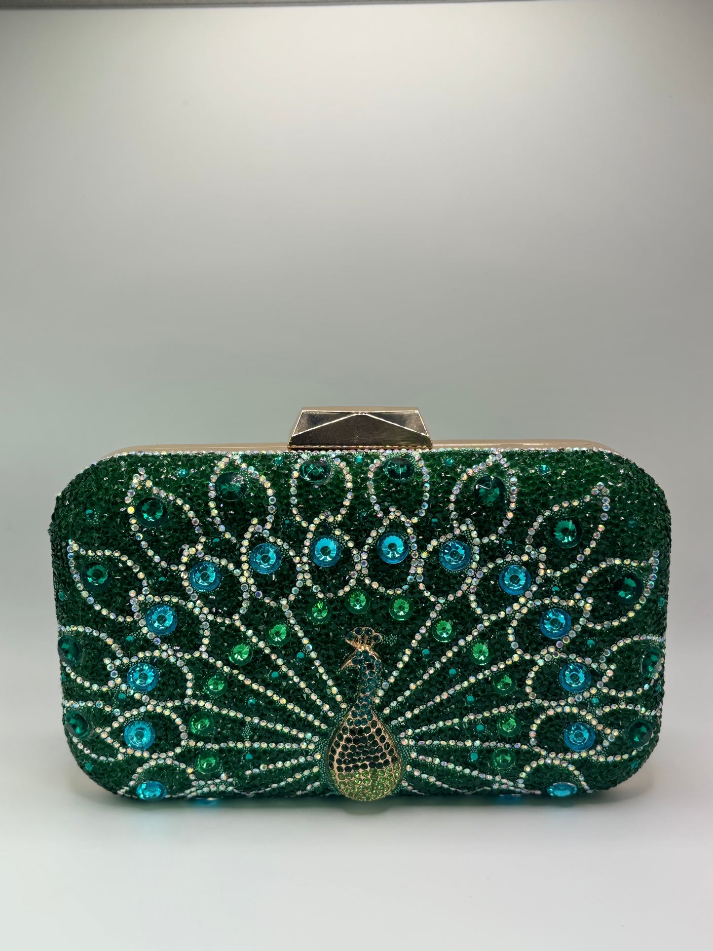 Clutch Pavo Real