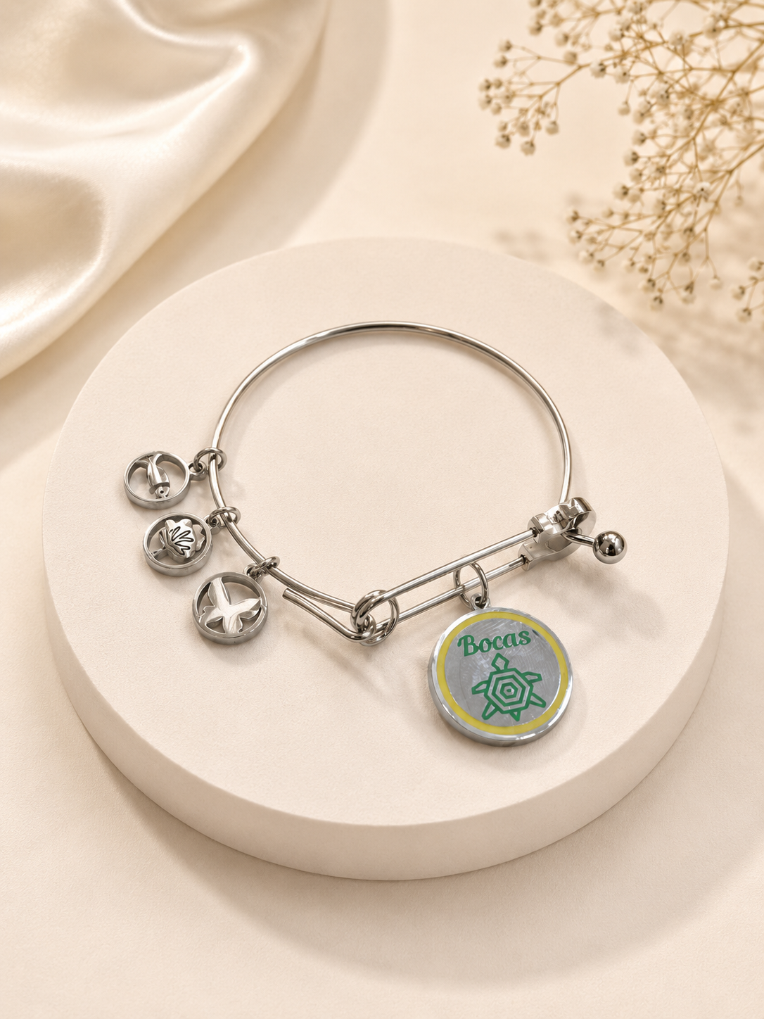 PULSERA PLATEADA BOCAS