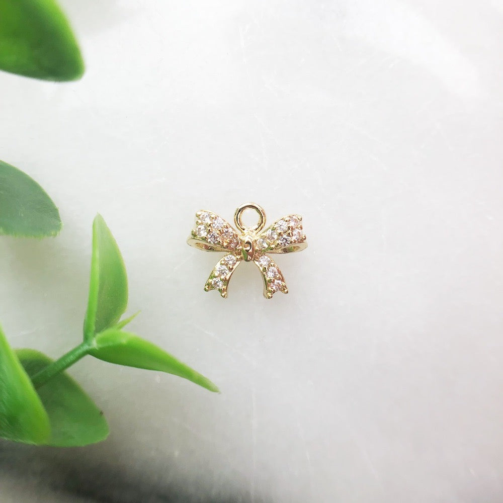 DIJE LAZO CON CIRCONES