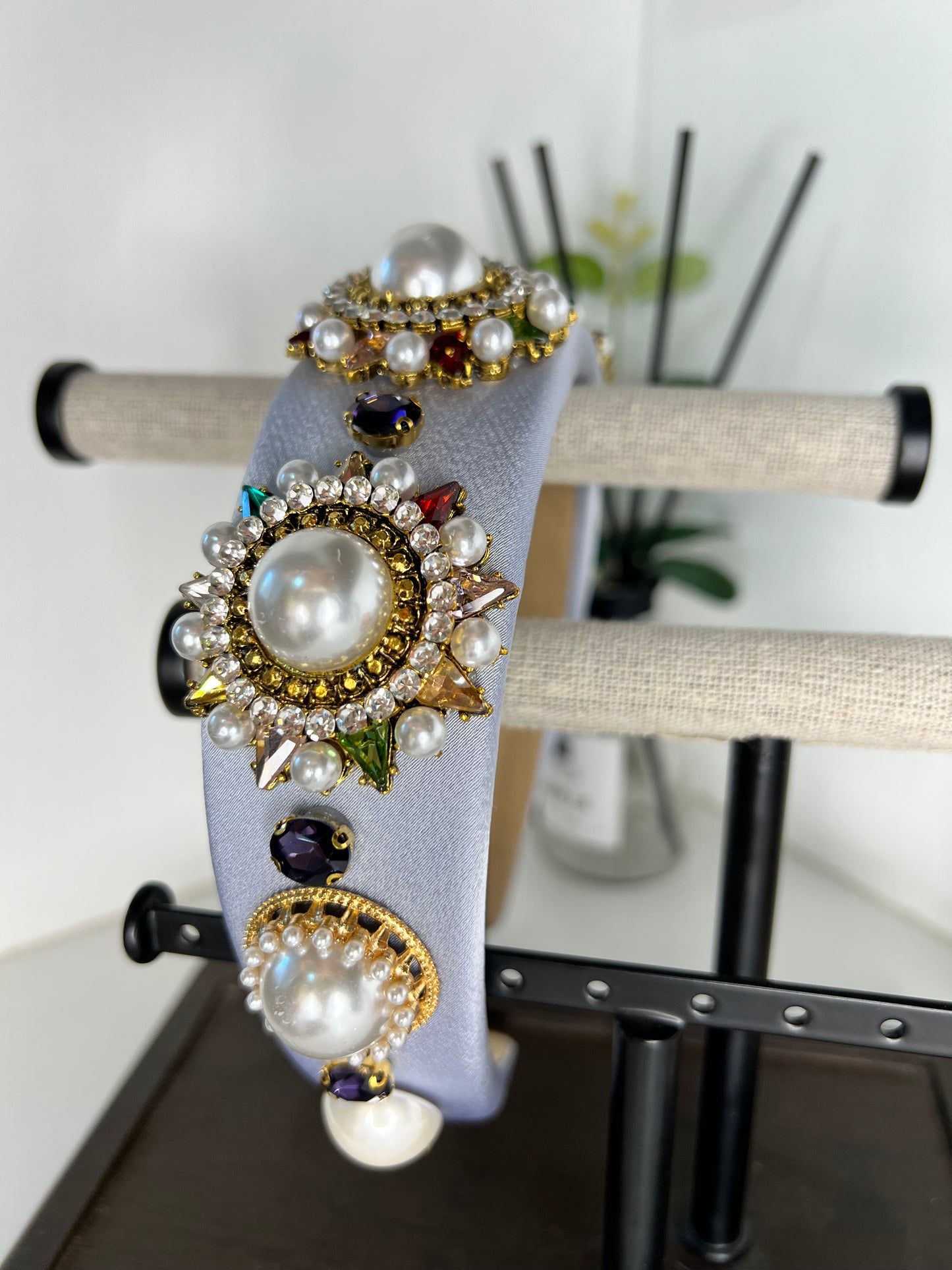 Diadema con diseño de perla celeste 02712