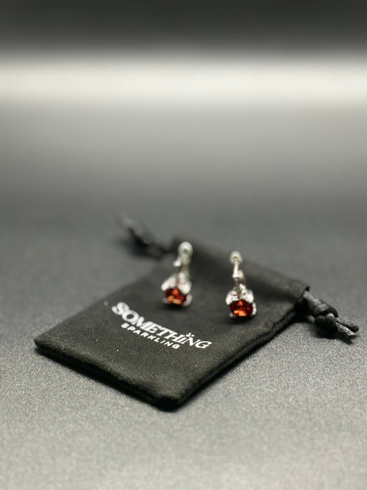 Argollas de Plata 925 y cristal en tono rubi