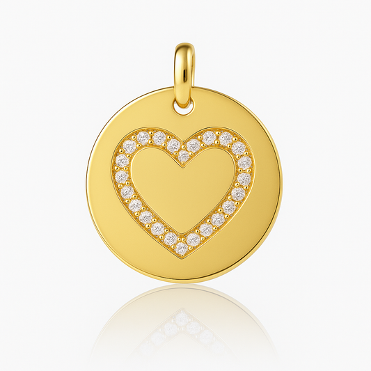 DIJE CIRCULAR CON SILUETA DE CIRCON EN CORAZON