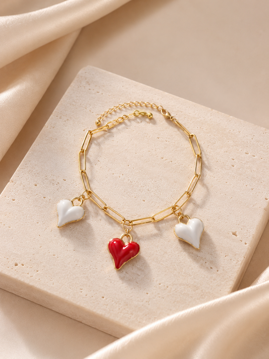Pulsera triple corazón baño de oro