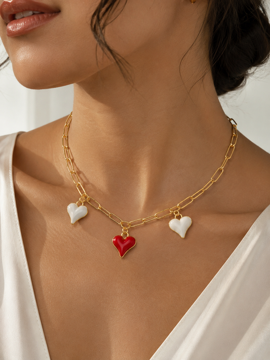 Collar triple corazón baño de oro
