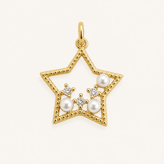 Dije estrella con tres circones y perlitas
