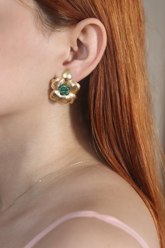 Topos de flor con cristales verdes