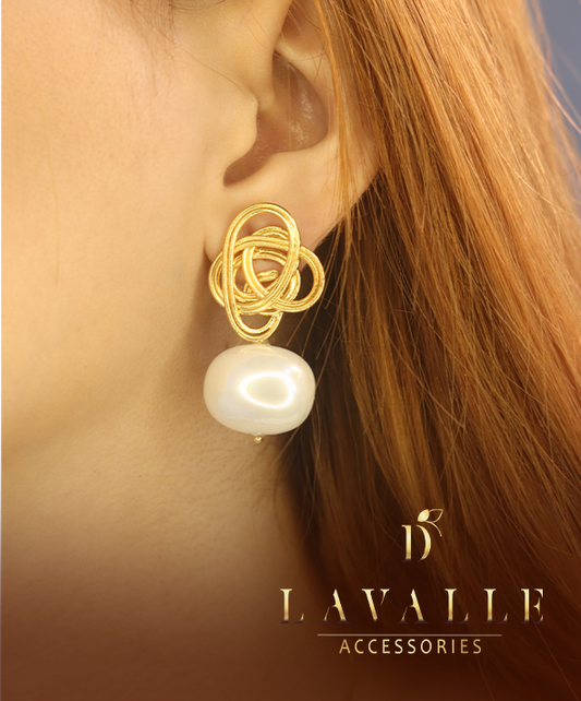 Aretes en espirales y perla natural